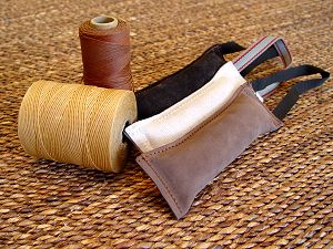 Mastiff dog bite tug made of leather with handle